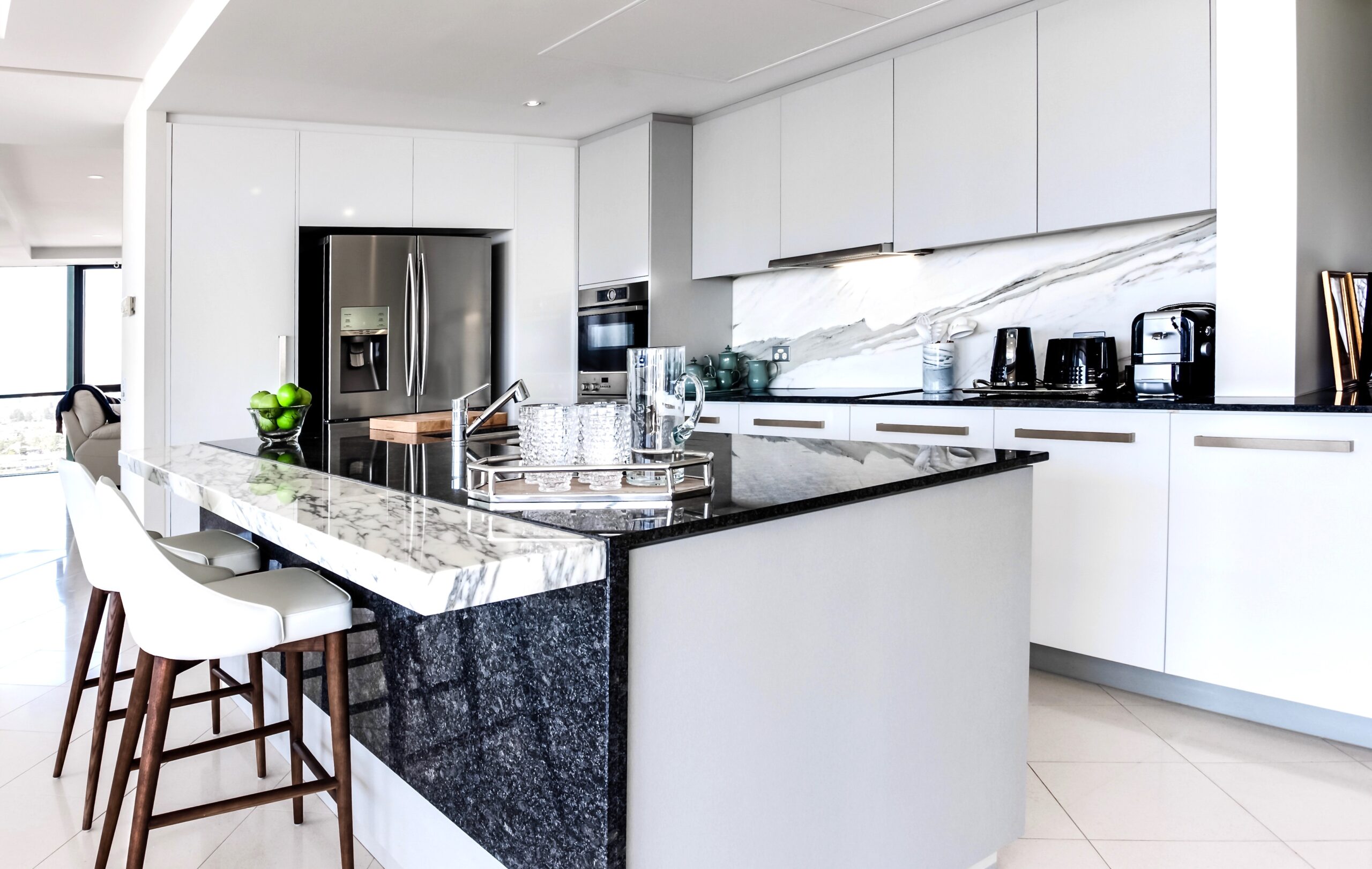 Bulk head inside a modern kitchen with stone bench